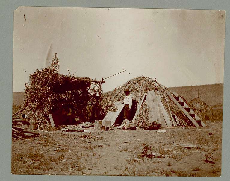 Picture shows Apache wickiup