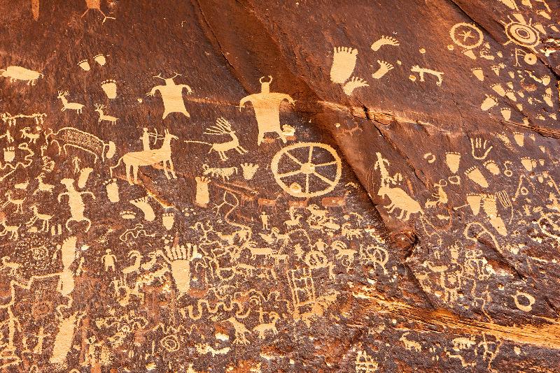 Pictture shows Petroglyphs or rock carving on Newspaper Rock, Utah, USA. Many of the tribes that we will study in this course have deep temporal connections with the southwest. The rock art may have been produced centuries ago by ancestors of the modern Puebloan people.