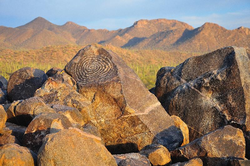 Picture showing the rocks, and evening light on signal hill petroglyph