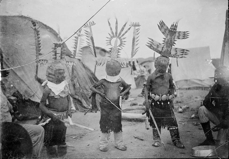 Black and White picture shows Apache crown dancers from 1889