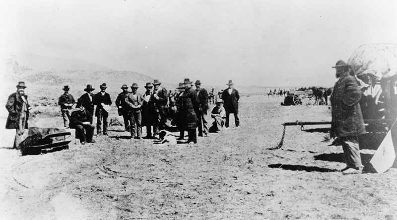 Picture shows John D. Lee, shortly before his execution at the site of the Mountain Meadows massacre in 1877. Although he confessed to the crime, Lee claimed that he had been acting on instructions from Mormon authorities, who encouraged the attackers to dress as Paiutes so that the Paiutes would be blamed.